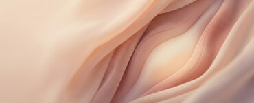 editorial image with layered warm-toned forms suggesting a subtle internal responsive zone rather than a tiny hidden spot.