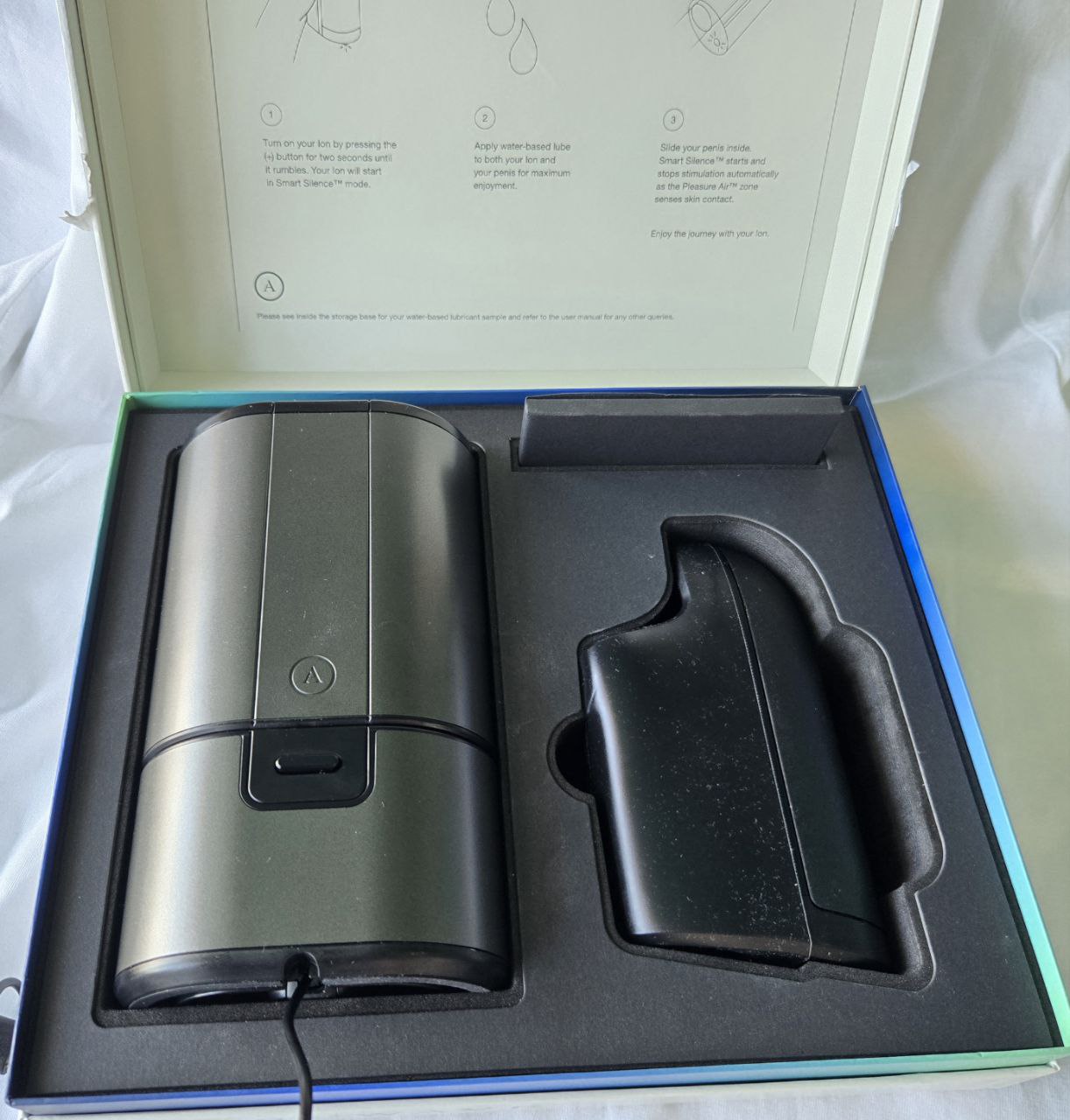 Arcwave Ion unboxing—showing main unit, drying base, and storage tray inside the original packaging