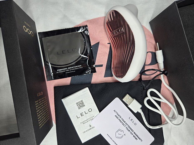 LELO Sona 3 unboxing showing toy, charger, pouch, manual, and lube—what I actually got in the box before my first use