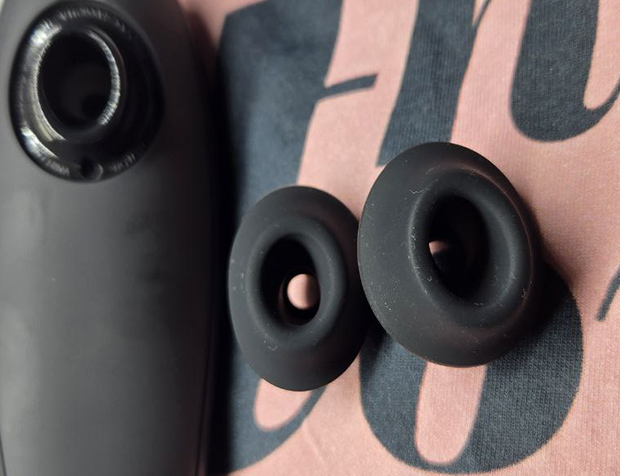 Classic 2’s nozzle removed, showing the insert slot and underside of both small and medium silicone heads. Used during testing to compare seal tightness and comfort on sensitive skin.
