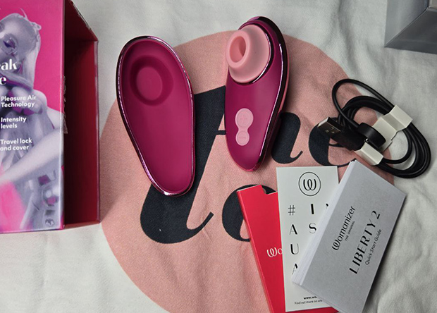 My unboxing of the Womanizer Liberty 2: toy, charger, instructions and packaging—all items you actually receive