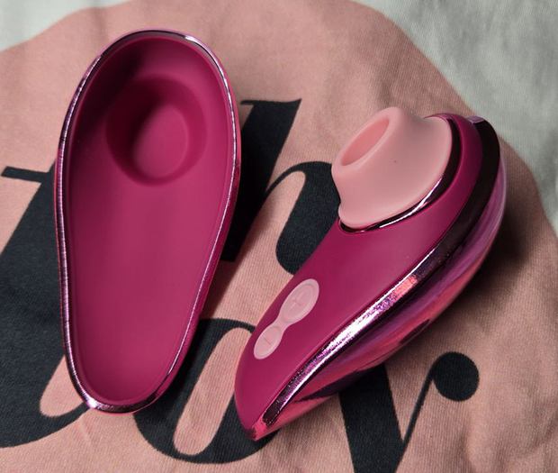 Shot of my Womanizer Liberty 2 with its magnetic cover off—real-life view of how compact and easy it is to pack