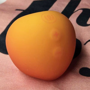 Womanizer Peach Pleasure Air Clit Stimulator