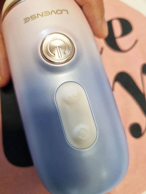 Lovense Spinel control buttons showing power, vibration, and thrust controls for easy manual operation