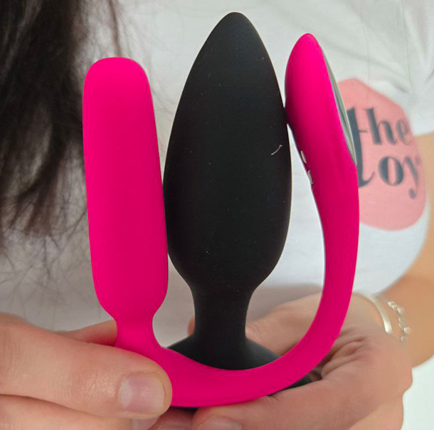Amie holding Lush Anal and Hush 2 S next to each other to demonstrate the differences.