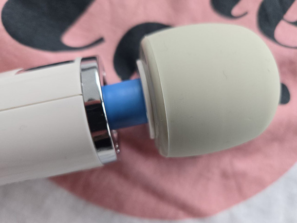 Detailed view of the Magic Wand Rechargeable's plush silicone head, showing the cylindrical shape and the lip at the top that can be used for more focused stimulation.