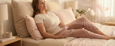 Woman reclining in bed with a calm curious expression during gentle internal-pleasure exploration.