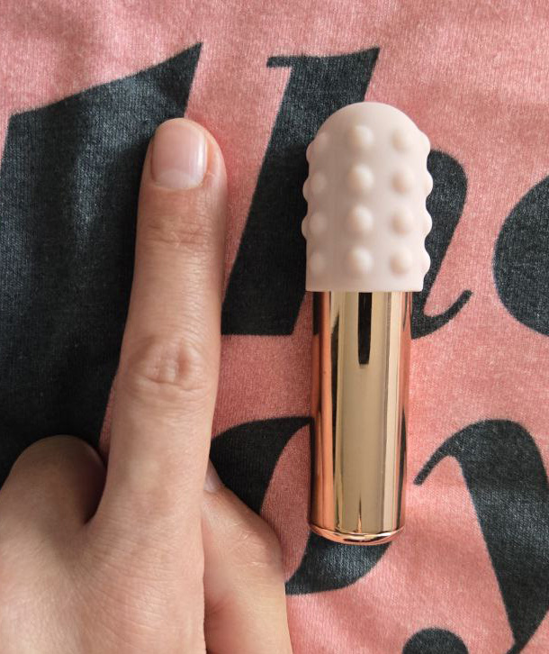 Le Wand Bullet compared to a female index finger