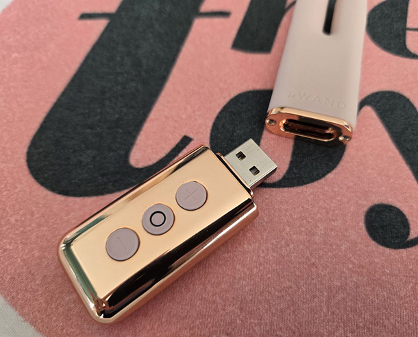 Demonstrating Le Wand Deux modular design and USB charging stick.