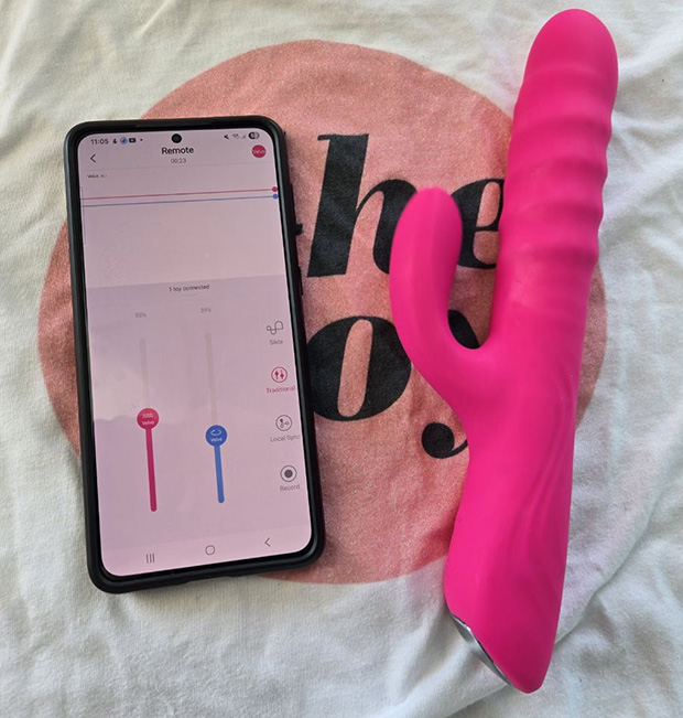 Lovense Velvo beside a phone showing the Lovense app controls for separate internal and external intensity adjustment.