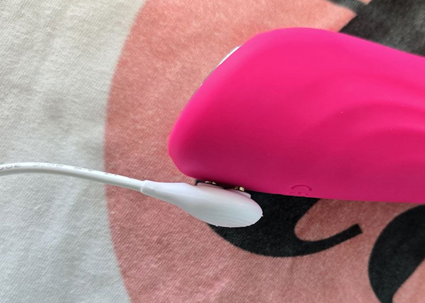 Charging on Velvo with its magnetic charger.