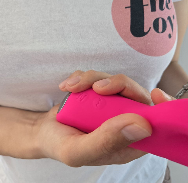 Lovense Velvo shown in hand to demonstrate its size, weight, and handle grip.
