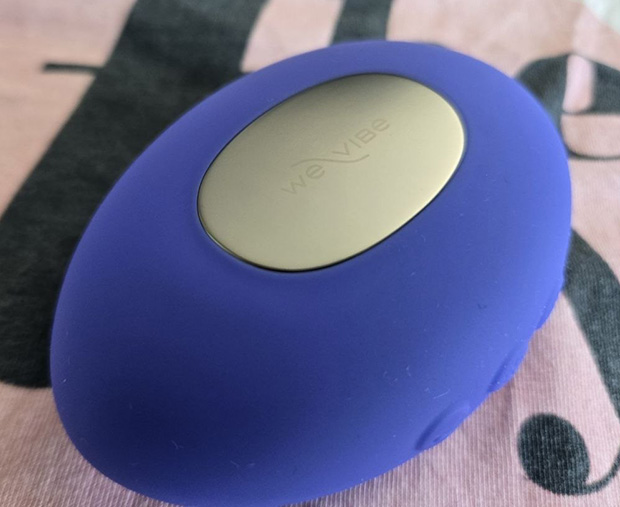 Underside view of the We-Vibe Temp showing the stainless-steel heating and cooling plate surrounded by smooth lavender silicone