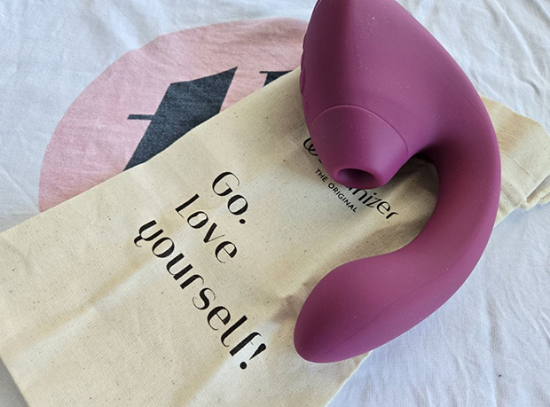 Womanizer Next Duo G-spot arm close up over its pouch